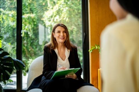 A licensed professional counselor meets with a client.