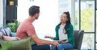A counselor in a session with a patient