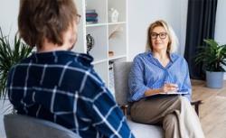 Counselor is talking to the patient